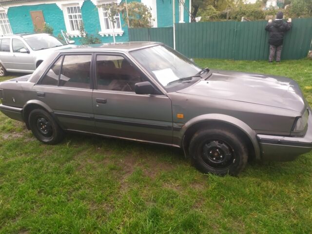 Серый Ниссан Блюберд, объемом двигателя 2 л и пробегом 500 тыс. км за 0 $, фото 5 на Automoto.ua