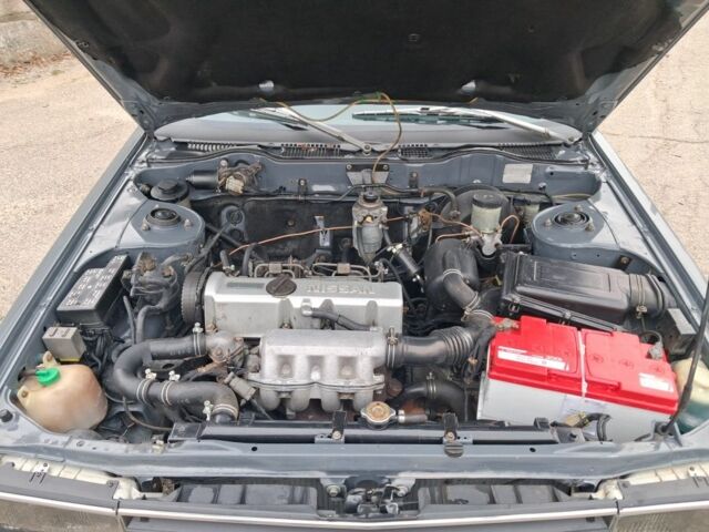 Сірий Ніссан Блюберд, об'ємом двигуна 2 л та пробігом 583 тис. км за 1200 $, фото 7 на Automoto.ua