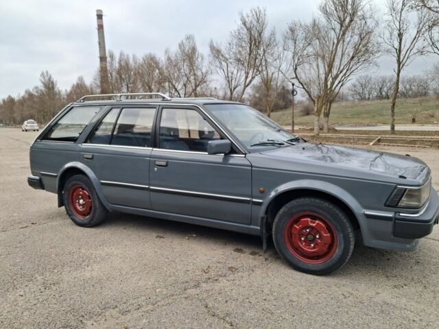 Сірий Ніссан Блюберд, об'ємом двигуна 2 л та пробігом 583 тис. км за 1200 $, фото 3 на Automoto.ua