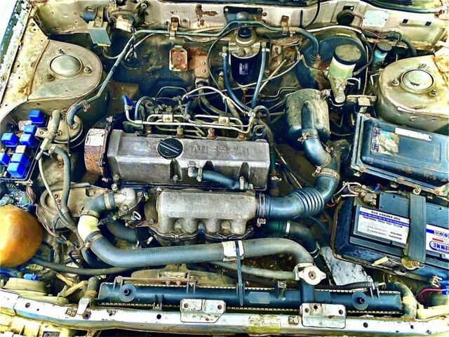 Серый Ниссан Блюберд, объемом двигателя 2 л и пробегом 450 тыс. км за 1022 $, фото 9 на Automoto.ua