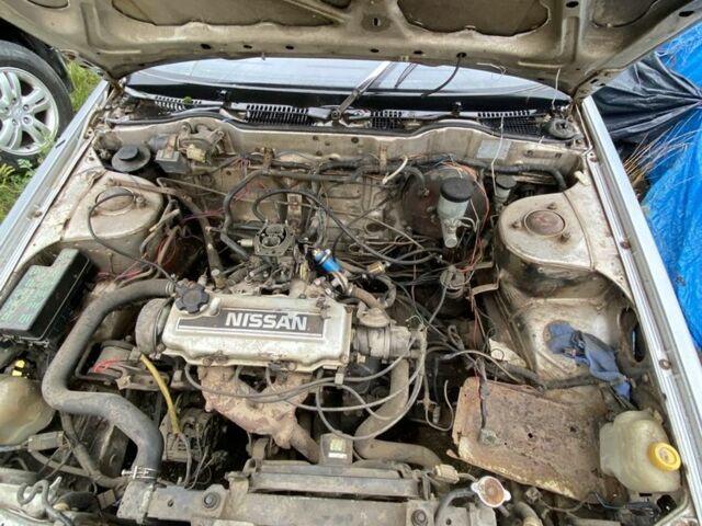 Серый Ниссан Блюберд, объемом двигателя 2 л и пробегом 350 тыс. км за 450 $, фото 6 на Automoto.ua