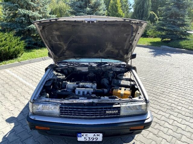 Сірий Ніссан Блюберд, об'ємом двигуна 2 л та пробігом 250 тис. км за 2000 $, фото 13 на Automoto.ua