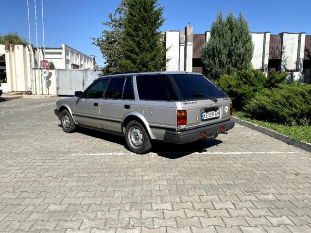 Сірий Ніссан Блюберд, об'ємом двигуна 2 л та пробігом 250 тис. км за 2000 $, фото 6 на Automoto.ua