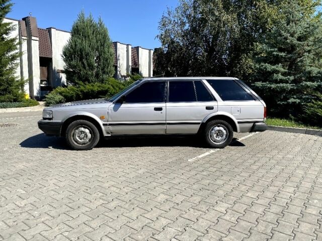 Сірий Ніссан Блюберд, об'ємом двигуна 2 л та пробігом 250 тис. км за 2000 $, фото 3 на Automoto.ua