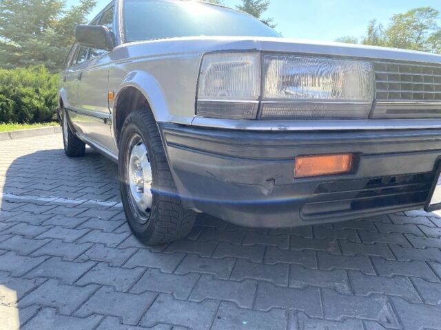 Сірий Ніссан Блюберд, об'ємом двигуна 2 л та пробігом 250 тис. км за 2000 $, фото 21 на Automoto.ua