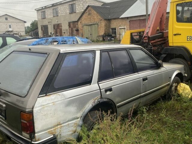 Серый Ниссан Блюберд, объемом двигателя 2 л и пробегом 350 тыс. км за 450 $, фото 3 на Automoto.ua