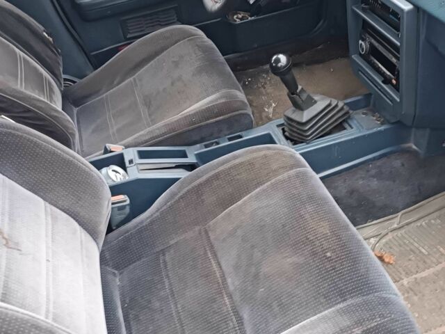 Синий Ниссан Блюберд, объемом двигателя 2 л и пробегом 108 тыс. км за 450 $, фото 2 на Automoto.ua