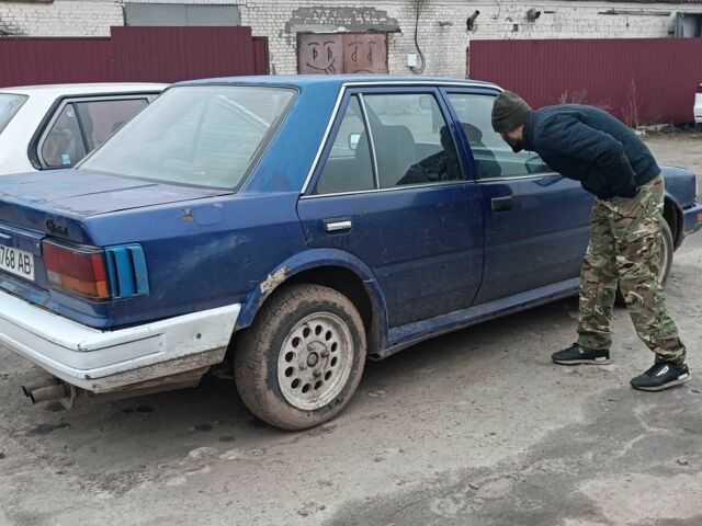 Синий Ниссан Блюберд, объемом двигателя 2 л и пробегом 108 тыс. км за 450 $, фото 5 на Automoto.ua