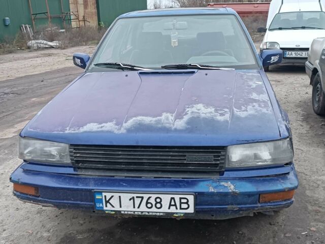 Синий Ниссан Блюберд, объемом двигателя 2 л и пробегом 108 тыс. км за 450 $, фото 7 на Automoto.ua