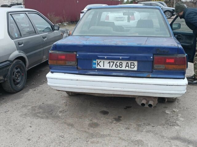 Синий Ниссан Блюберд, объемом двигателя 2 л и пробегом 108 тыс. км за 450 $, фото 4 на Automoto.ua