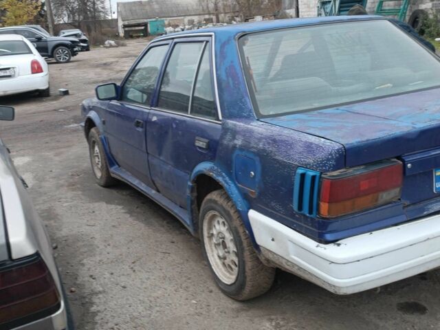 Синий Ниссан Блюберд, объемом двигателя 2 л и пробегом 108 тыс. км за 450 $, фото 3 на Automoto.ua