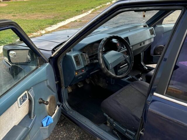 Синий Ниссан Блюберд, объемом двигателя 2 л и пробегом 413 тыс. км за 2200 $, фото 13 на Automoto.ua