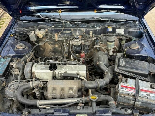 Синий Ниссан Блюберд, объемом двигателя 2 л и пробегом 413 тыс. км за 2200 $, фото 21 на Automoto.ua