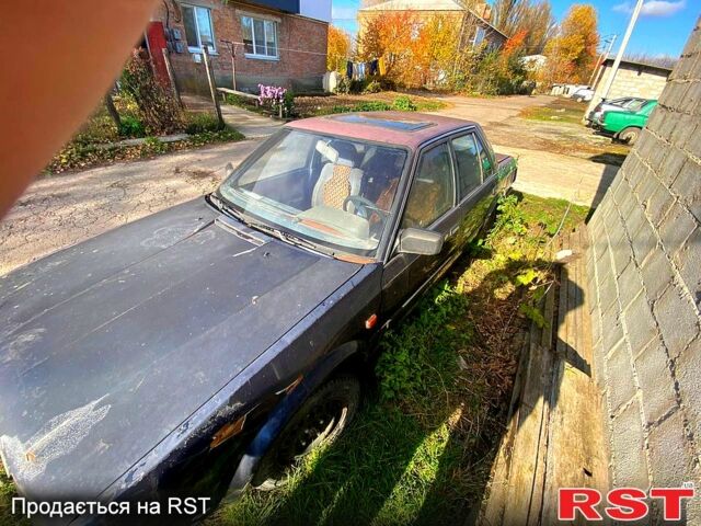 Синий Ниссан Блюберд, объемом двигателя 2 л и пробегом 400 тыс. км за 400 $, фото 6 на Automoto.ua