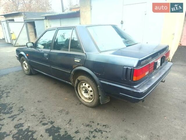 Синий Ниссан Блюберд, объемом двигателя 2 л и пробегом 230 тыс. км за 1700 $, фото 5 на Automoto.ua