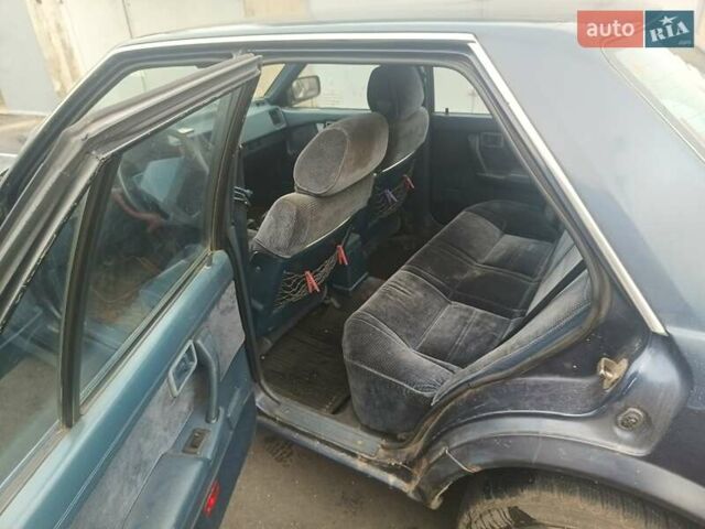 Синий Ниссан Блюберд, объемом двигателя 2 л и пробегом 230 тыс. км за 1700 $, фото 14 на Automoto.ua