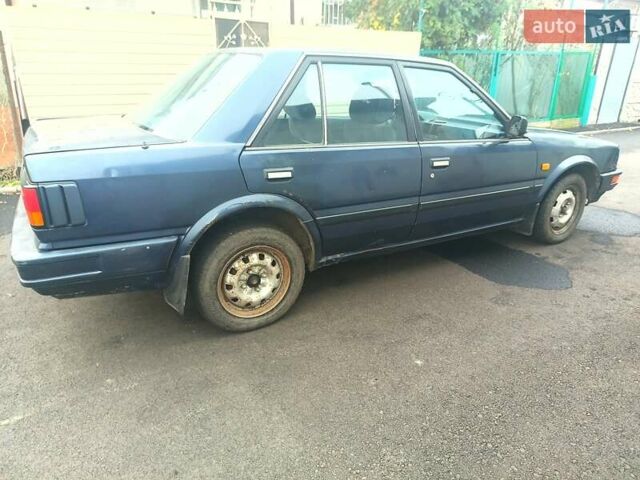 Синий Ниссан Блюберд, объемом двигателя 2 л и пробегом 230 тыс. км за 1700 $, фото 3 на Automoto.ua