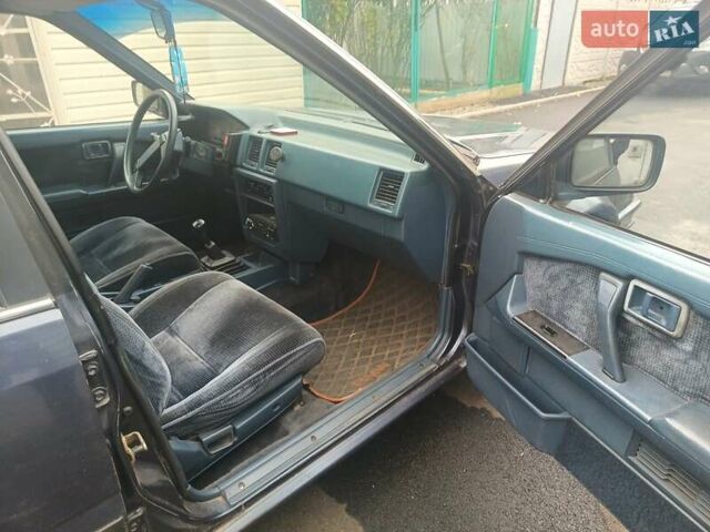 Синий Ниссан Блюберд, объемом двигателя 2 л и пробегом 230 тыс. км за 1700 $, фото 10 на Automoto.ua