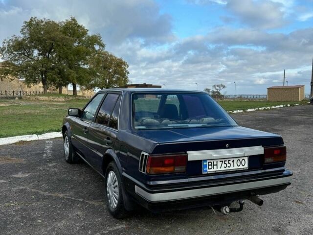 Синий Ниссан Блюберд, объемом двигателя 2 л и пробегом 413 тыс. км за 2200 $, фото 8 на Automoto.ua