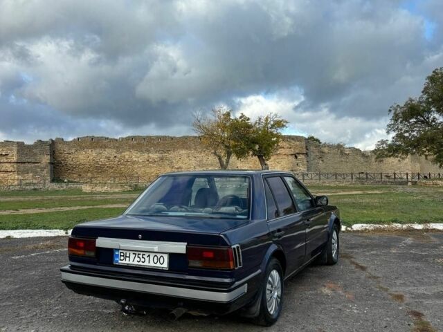 Синий Ниссан Блюберд, объемом двигателя 2 л и пробегом 413 тыс. км за 2200 $, фото 7 на Automoto.ua