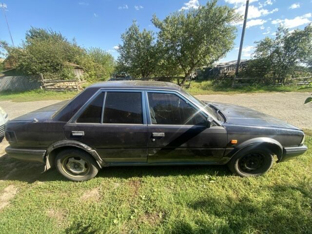 Синий Ниссан Блюберд, объемом двигателя 2 л и пробегом 500 тыс. км за 483 $, фото 5 на Automoto.ua