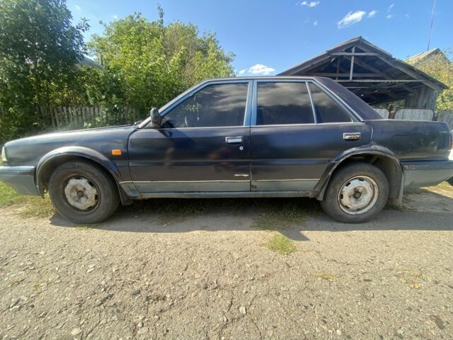 Синий Ниссан Блюберд, объемом двигателя 2 л и пробегом 500 тыс. км за 483 $, фото 4 на Automoto.ua