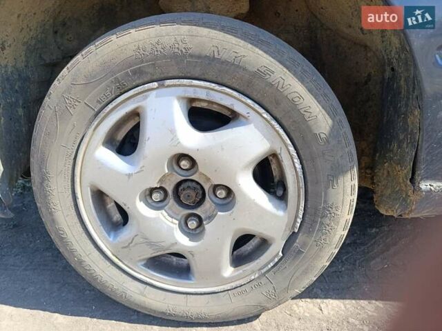 Синий Ниссан Блюберд, объемом двигателя 2 л и пробегом 370 тыс. км за 1200 $, фото 11 на Automoto.ua