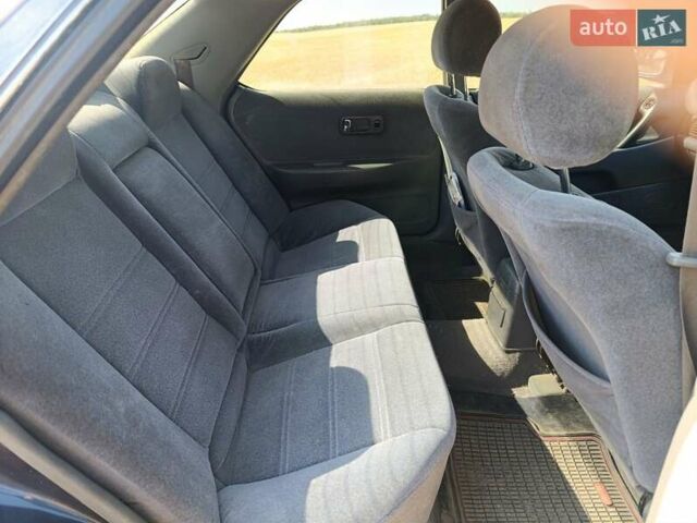 Синий Ниссан Блюберд, объемом двигателя 2 л и пробегом 370 тыс. км за 1200 $, фото 3 на Automoto.ua