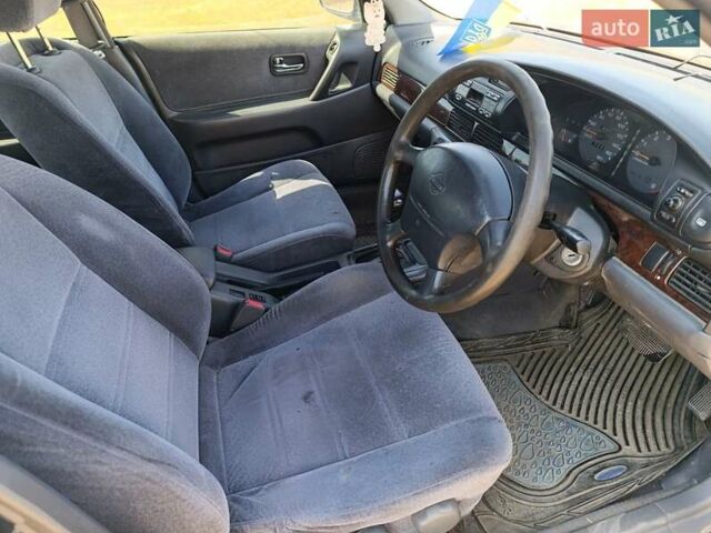 Синий Ниссан Блюберд, объемом двигателя 2 л и пробегом 370 тыс. км за 1200 $, фото 4 на Automoto.ua