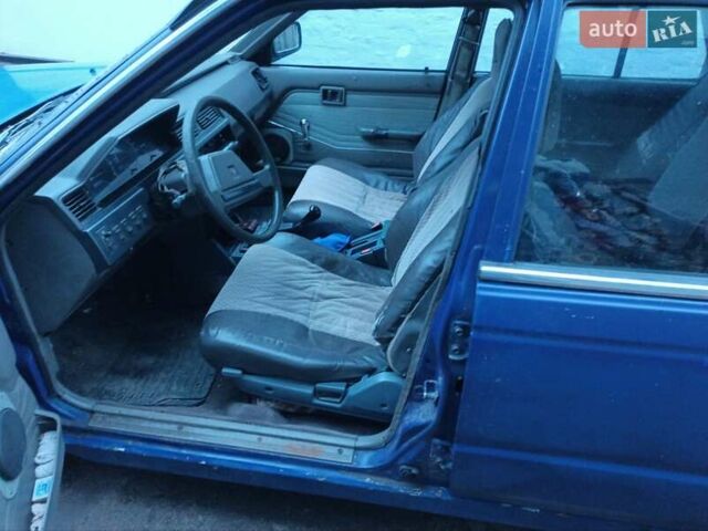 Синий Ниссан Блюберд, объемом двигателя 2 л и пробегом 500 тыс. км за 800 $, фото 3 на Automoto.ua