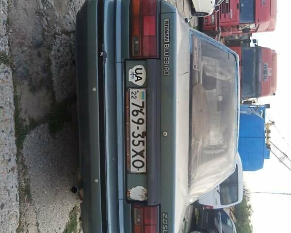 Зеленый Ниссан Блюберд, объемом двигателя 2 л и пробегом 294 тыс. км за 1100 $, фото 6 на Automoto.ua