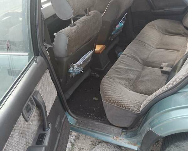 Зеленый Ниссан Блюберд, объемом двигателя 2 л и пробегом 294 тыс. км за 1100 $, фото 5 на Automoto.ua