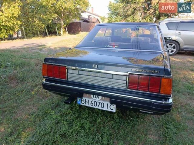 Синий Ниссан Цедрик, объемом двигателя 2 л и пробегом 150 тыс. км за 8000 $, фото 6 на Automoto.ua