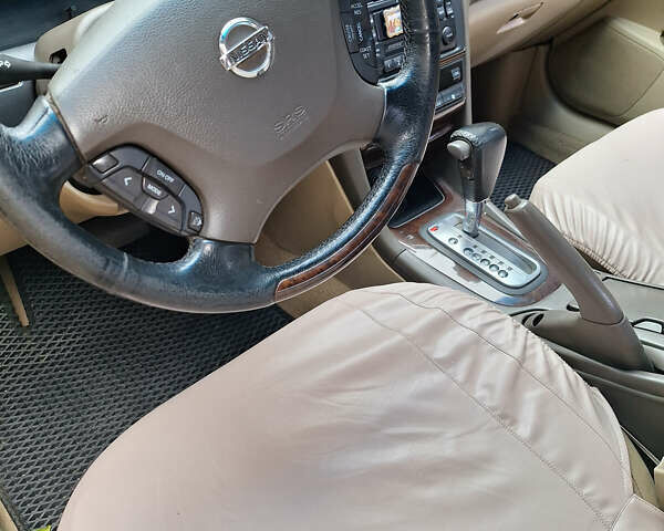 Чорний Ніссан Сефіро, об'ємом двигуна 2 л та пробігом 236 тис. км за 6500 $, фото 1 на Automoto.ua