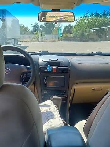 Зелений Ніссан Сефіро, об'ємом двигуна 2 л та пробігом 268 тис. км за 4000 $, фото 2 на Automoto.ua