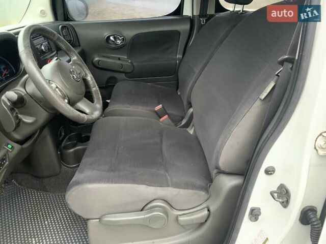 Белый Ниссан Куб, объемом двигателя 1.8 л и пробегом 195 тыс. км за 6000 $, фото 13 на Automoto.ua
