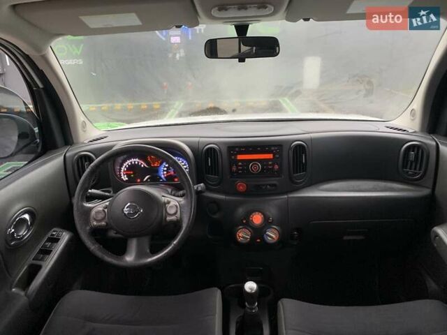 Белый Ниссан Куб, объемом двигателя 1.8 л и пробегом 195 тыс. км за 6000 $, фото 16 на Automoto.ua