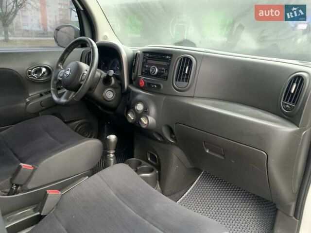 Белый Ниссан Куб, объемом двигателя 1.8 л и пробегом 195 тыс. км за 6000 $, фото 14 на Automoto.ua