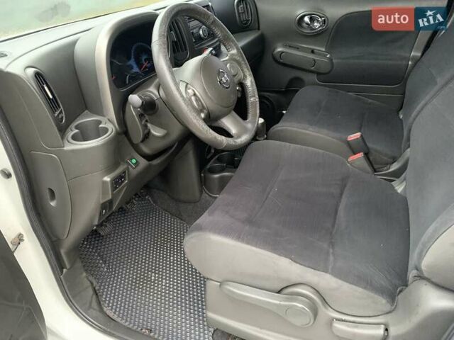 Белый Ниссан Куб, объемом двигателя 1.8 л и пробегом 195 тыс. км за 6000 $, фото 10 на Automoto.ua