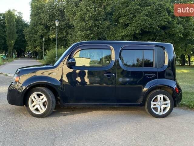 Черный Ниссан Куб, объемом двигателя 1.8 л и пробегом 237 тыс. км за 6500 $, фото 5 на Automoto.ua