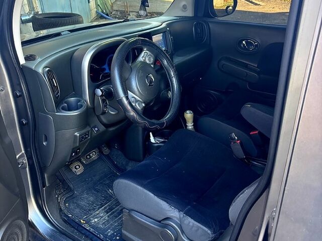 Серый Ниссан Куб, объемом двигателя 1.8 л и пробегом 300 тыс. км за 4700 $, фото 4 на Automoto.ua