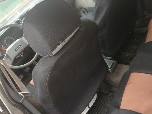 Серый Ниссан Куб, объемом двигателя 1.3 л и пробегом 400 тыс. км за 1700 $, фото 7 на Automoto.ua