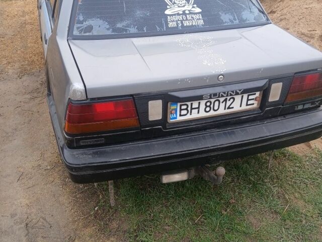 Серый Ниссан Куб, объемом двигателя 1.3 л и пробегом 400 тыс. км за 1700 $, фото 1 на Automoto.ua