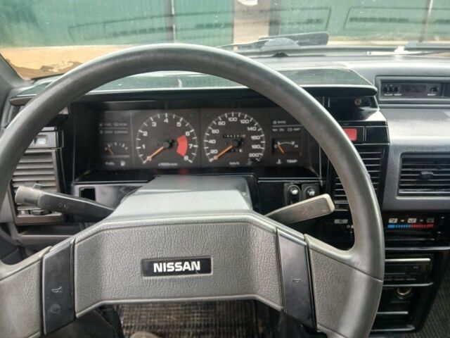 Серый Ниссан Куб, объемом двигателя 1.3 л и пробегом 400 тыс. км за 1700 $, фото 2 на Automoto.ua