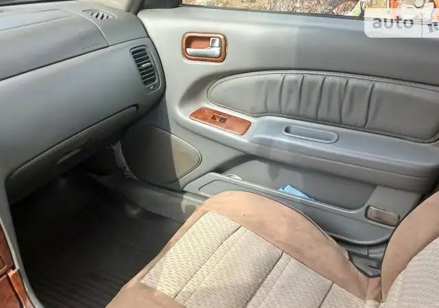 Білий Ніссан Інша, об'ємом двигуна 2 л та пробігом 20 тис. км за 1900 $, фото 4 на Automoto.ua