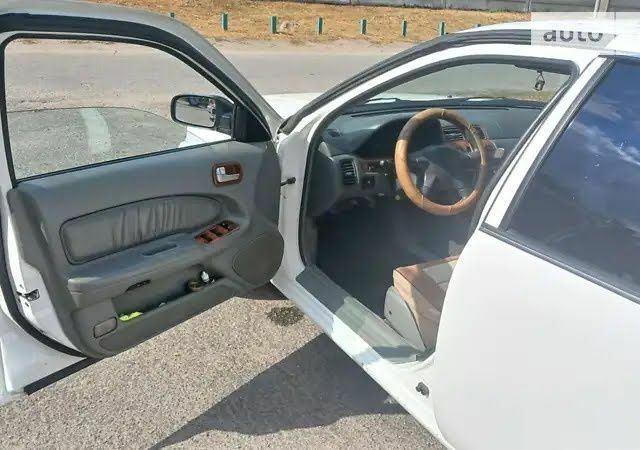 Білий Ніссан Інша, об'ємом двигуна 2 л та пробігом 20 тис. км за 1900 $, фото 2 на Automoto.ua