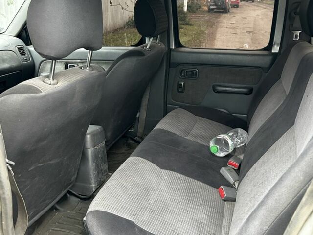 Черный Ниссан Другая, объемом двигателя 2.5 л и пробегом 320 тыс. км за 3933 $, фото 23 на Automoto.ua