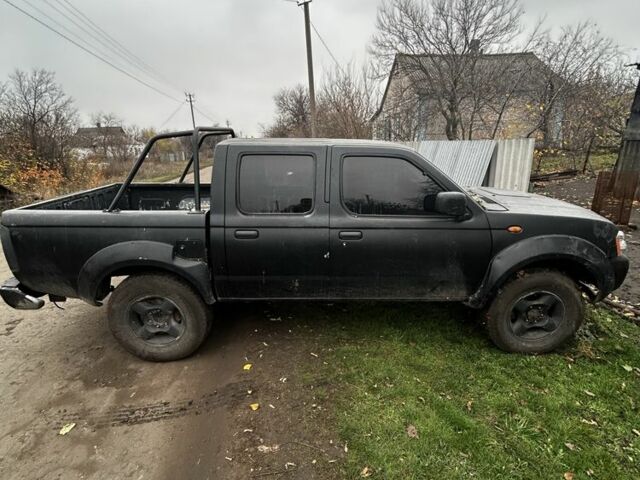 Черный Ниссан Другая, объемом двигателя 2.5 л и пробегом 320 тыс. км за 3933 $, фото 1 на Automoto.ua