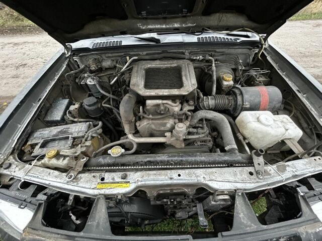 Черный Ниссан Другая, объемом двигателя 2.5 л и пробегом 320 тыс. км за 3933 $, фото 19 на Automoto.ua