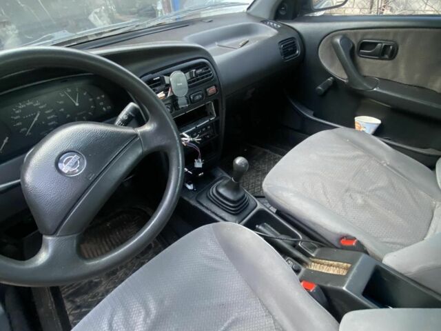 Серый Ниссан Другая, объемом двигателя 2 л и пробегом 390 тыс. км за 1300 $, фото 8 на Automoto.ua